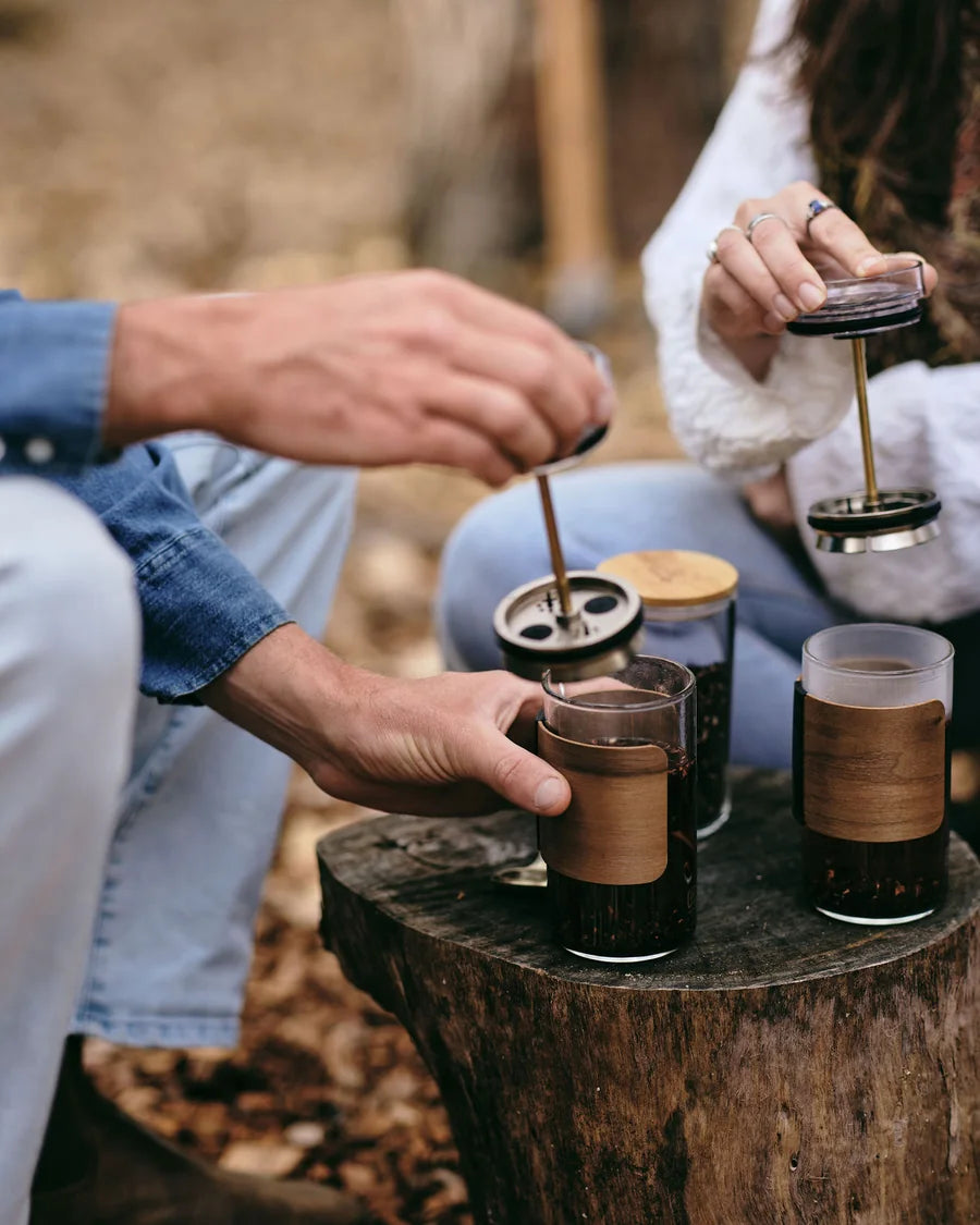 Cups by the fire and in the forest near home