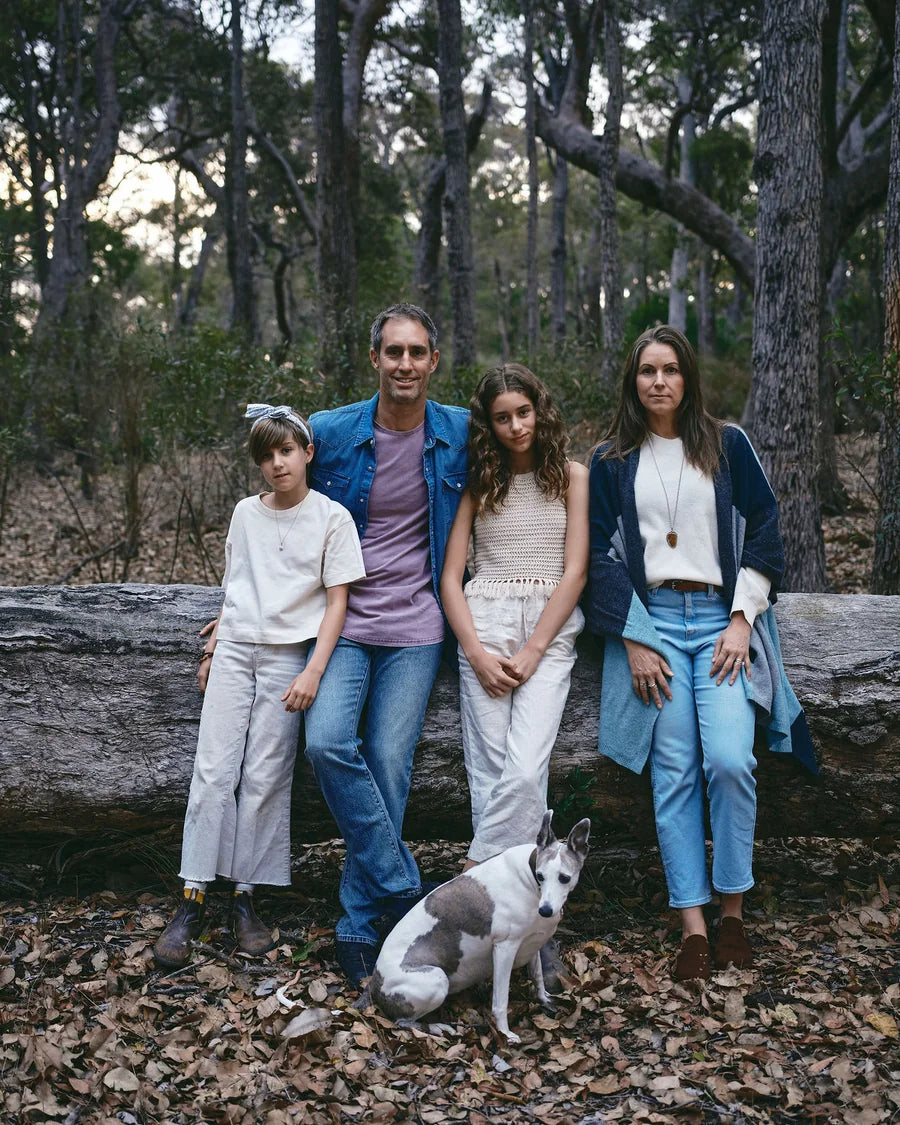Nick, his family in the forest, and a cup shared by the fire