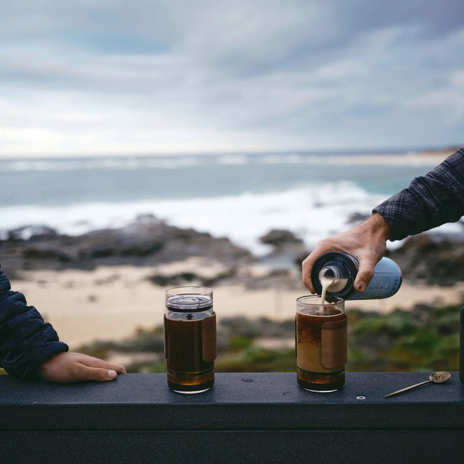 Milk poured into the GROUNDD xpress on a rail above the surf